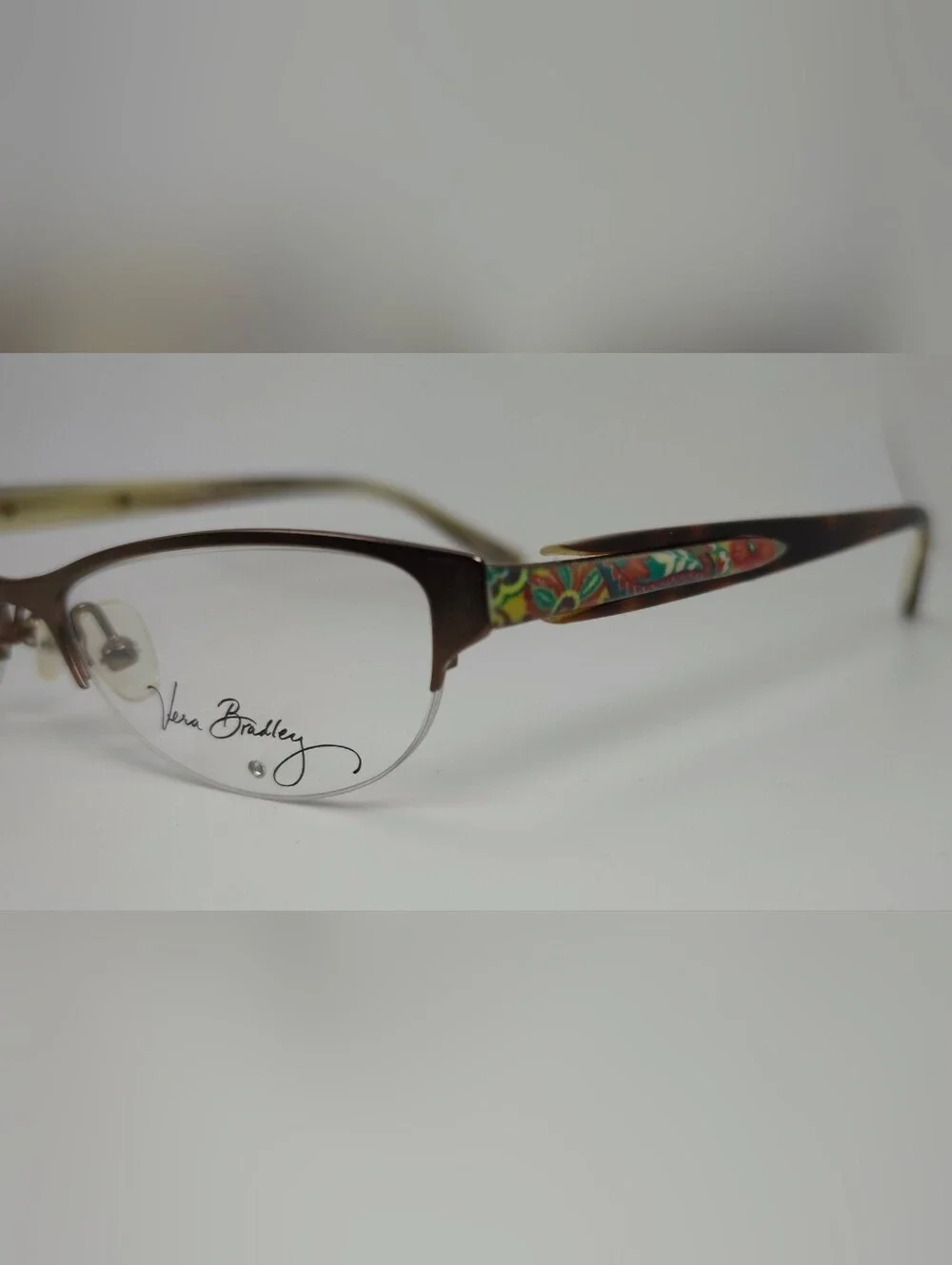 Lola. Vera Bradley Women's Semi-Rimless Glasses in Brown Matte. Small.